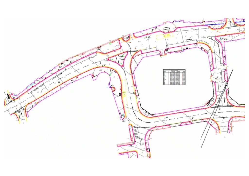 Topographical and utility survey of road junction showing PAS128 underground services mapping highway layout traffic islands and civil engineering design data